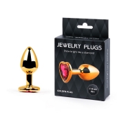 Золотистая анальная пробка с малиновым кристаллом-сердечком - 7 см. - Anal Jewelry Plug - купить с доставкой в Томске